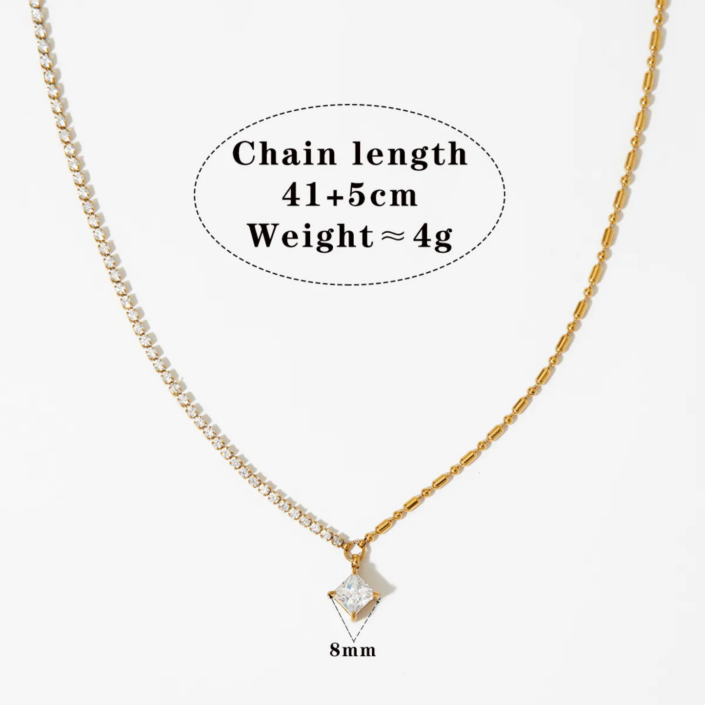 Gold chain necklace with a diamond pendant on a white background