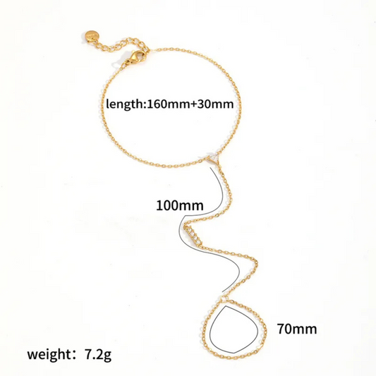 Gold ring bracelet with measurements on a white background