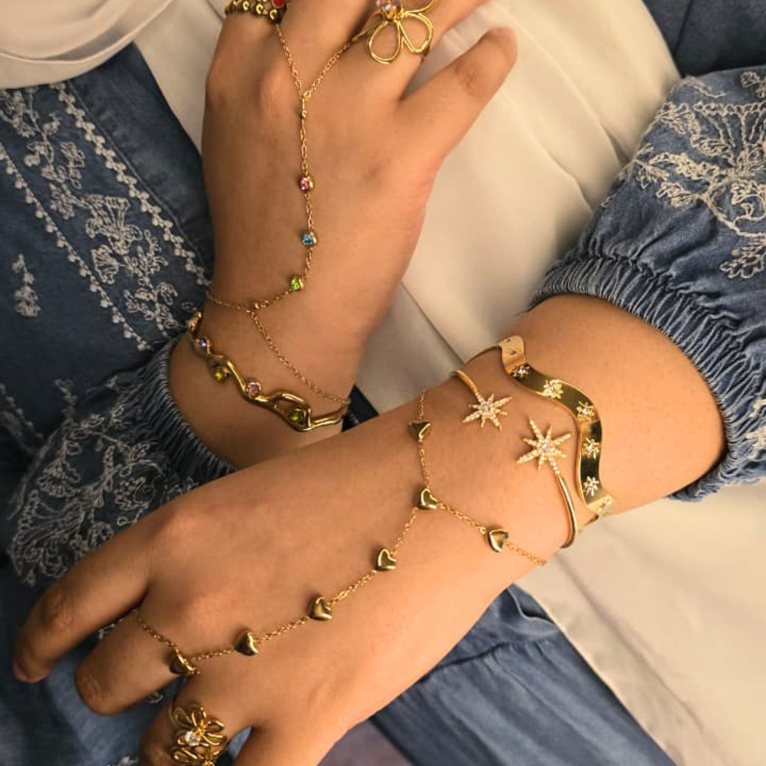 girl wearing ring, bangle and handchain