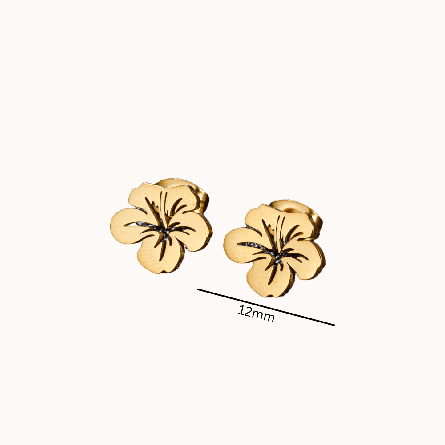 Gold floral earrings on a white background with a measurement label.