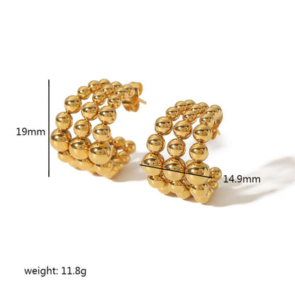 Gold beaded hoop earrings with measurements on a white background