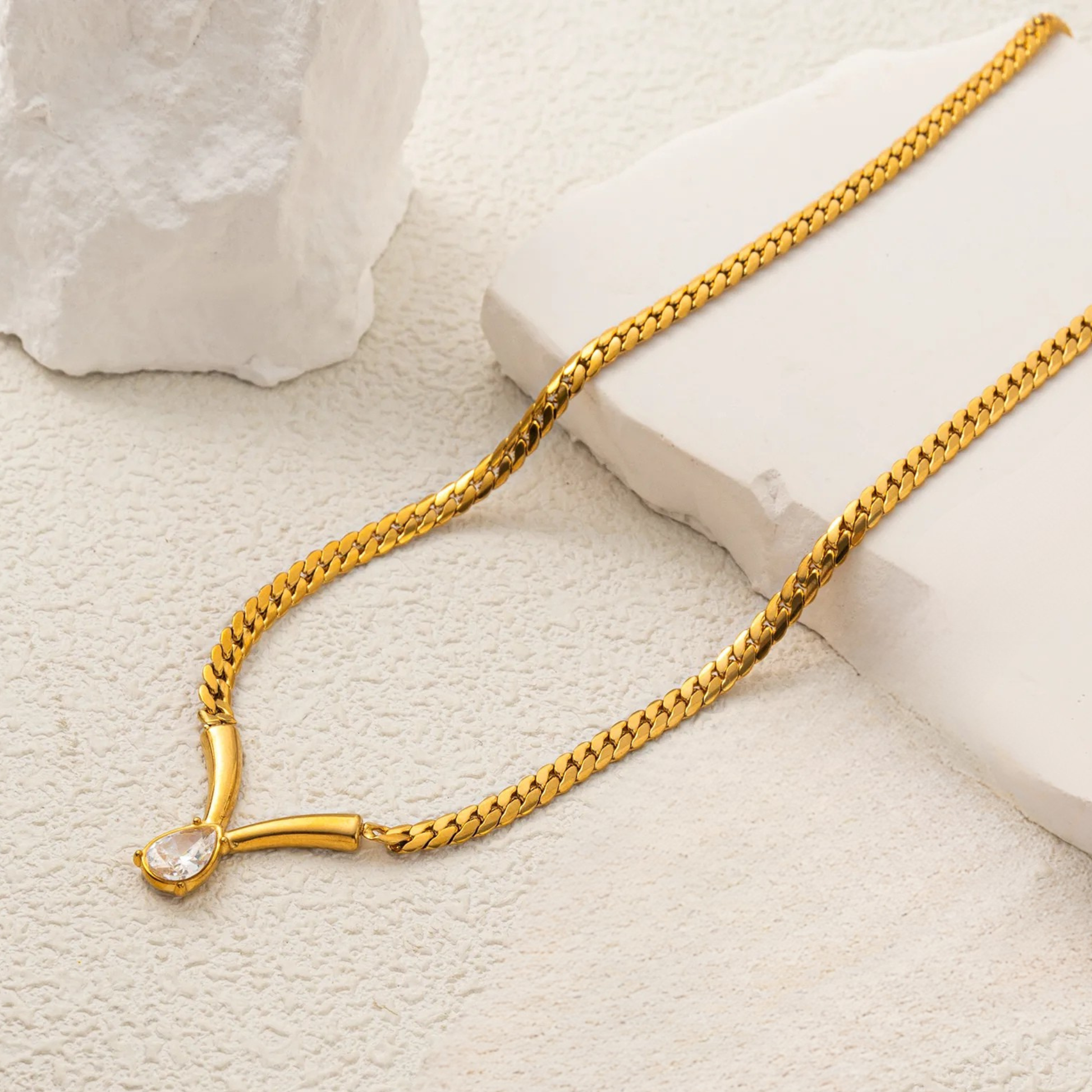 Gold chain necklace with Tear drop diamond pendant 