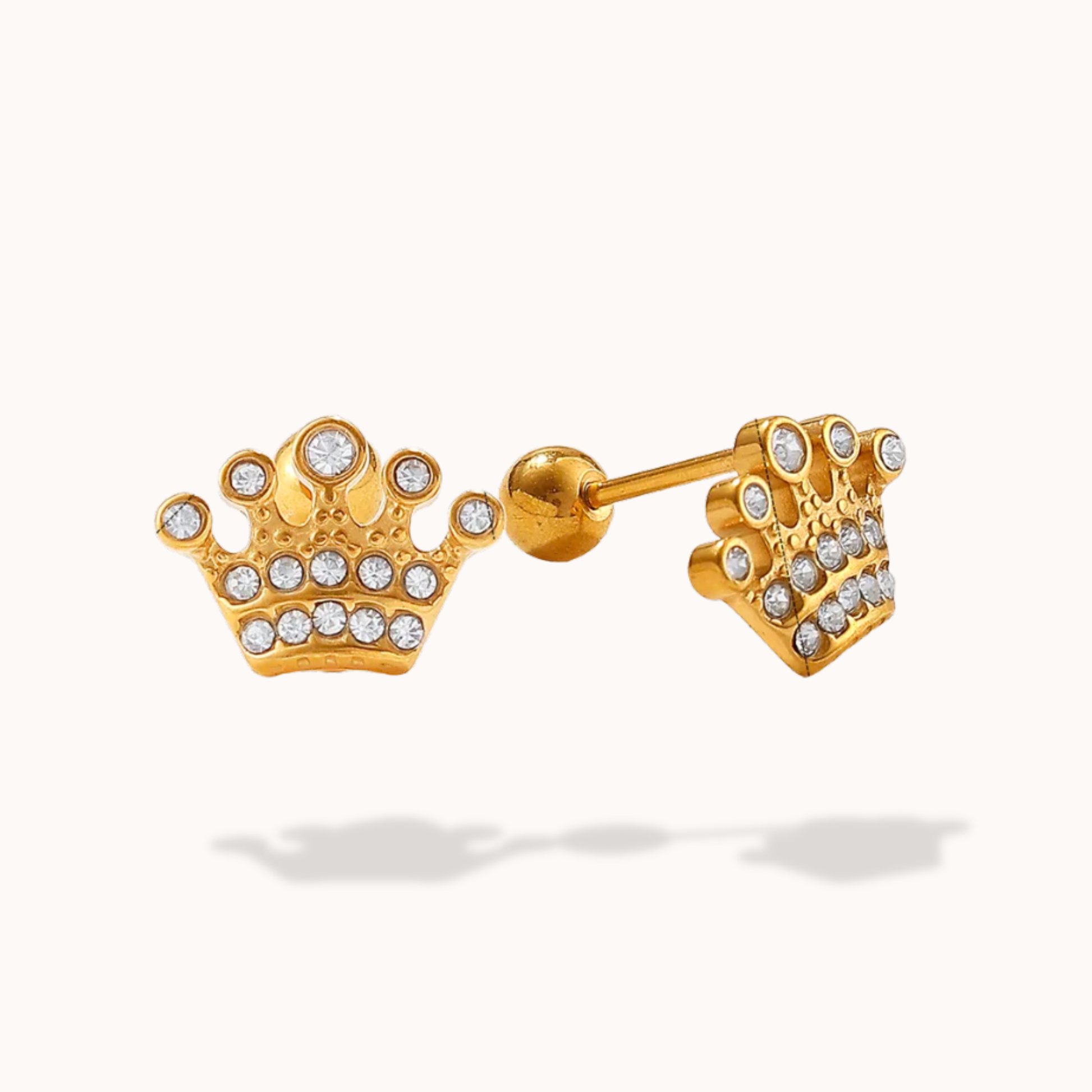 Gold crown-shaped earrings with clear gemstones on a white background