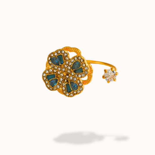 peacock blue diamond and crystal flower 360 rotating ring 