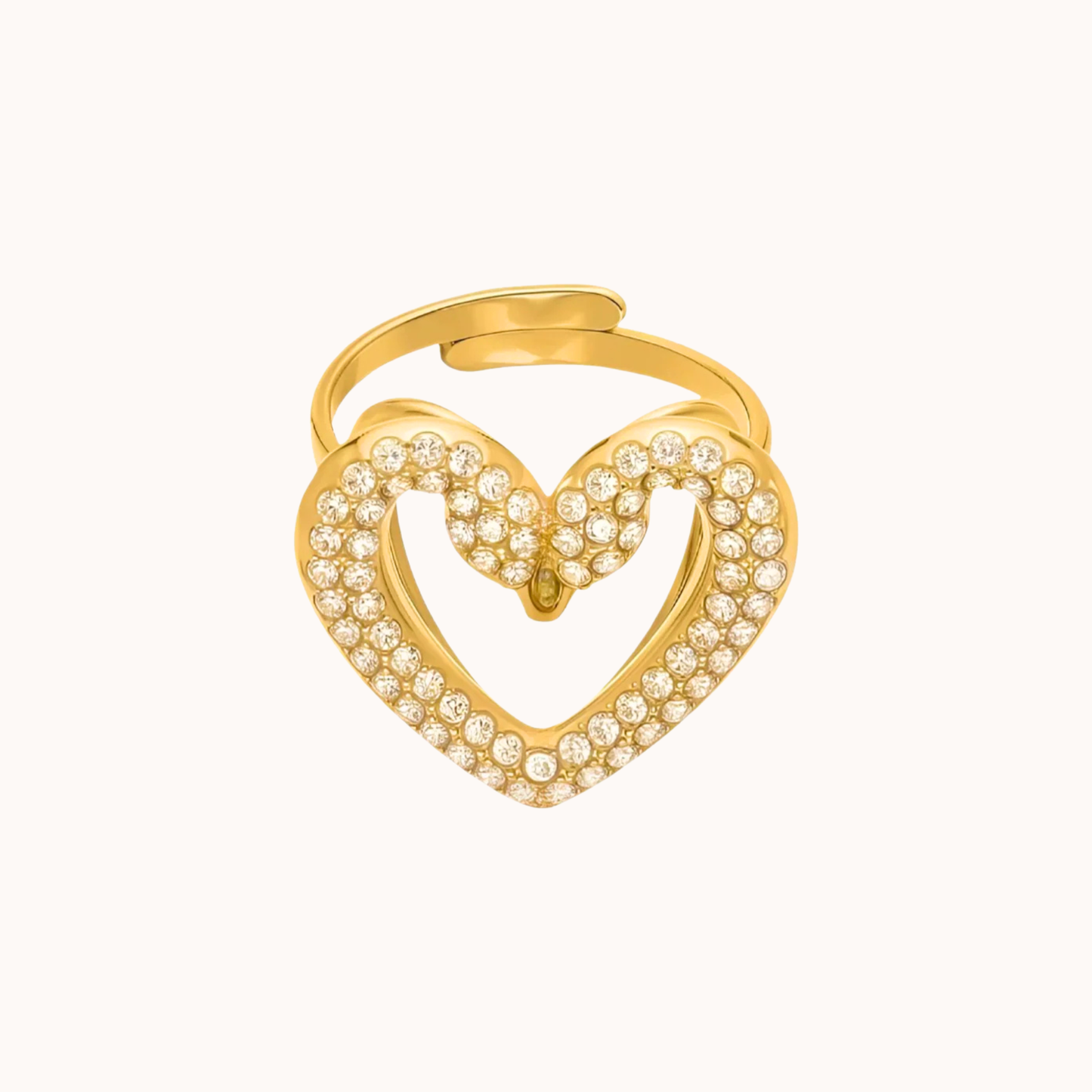 Gold swan heart-shaped ring with embedded stones on a white background