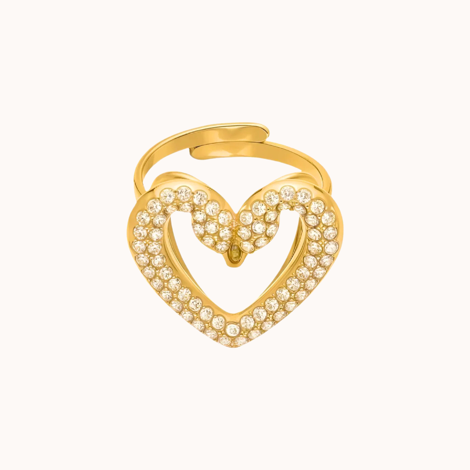 Gold swan heart-shaped ring with embedded stones on a white background