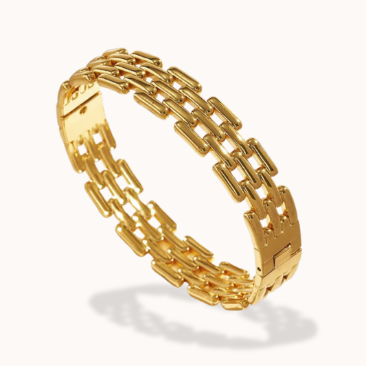 Gold chain bracelet on a white background