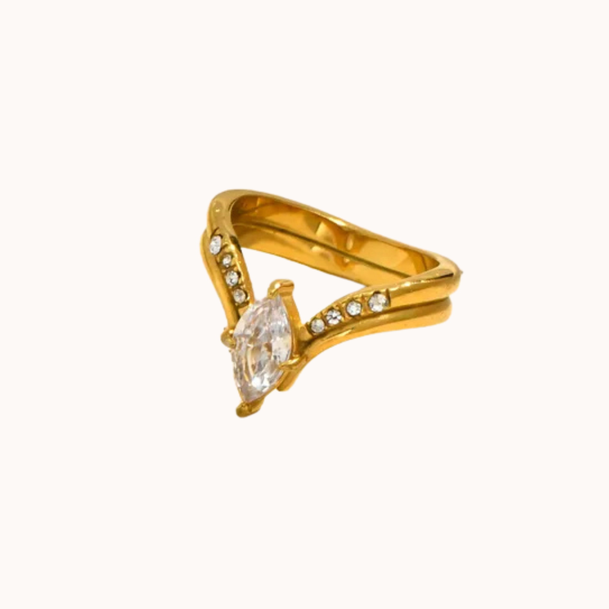 Gold ring with a diamond on a white background