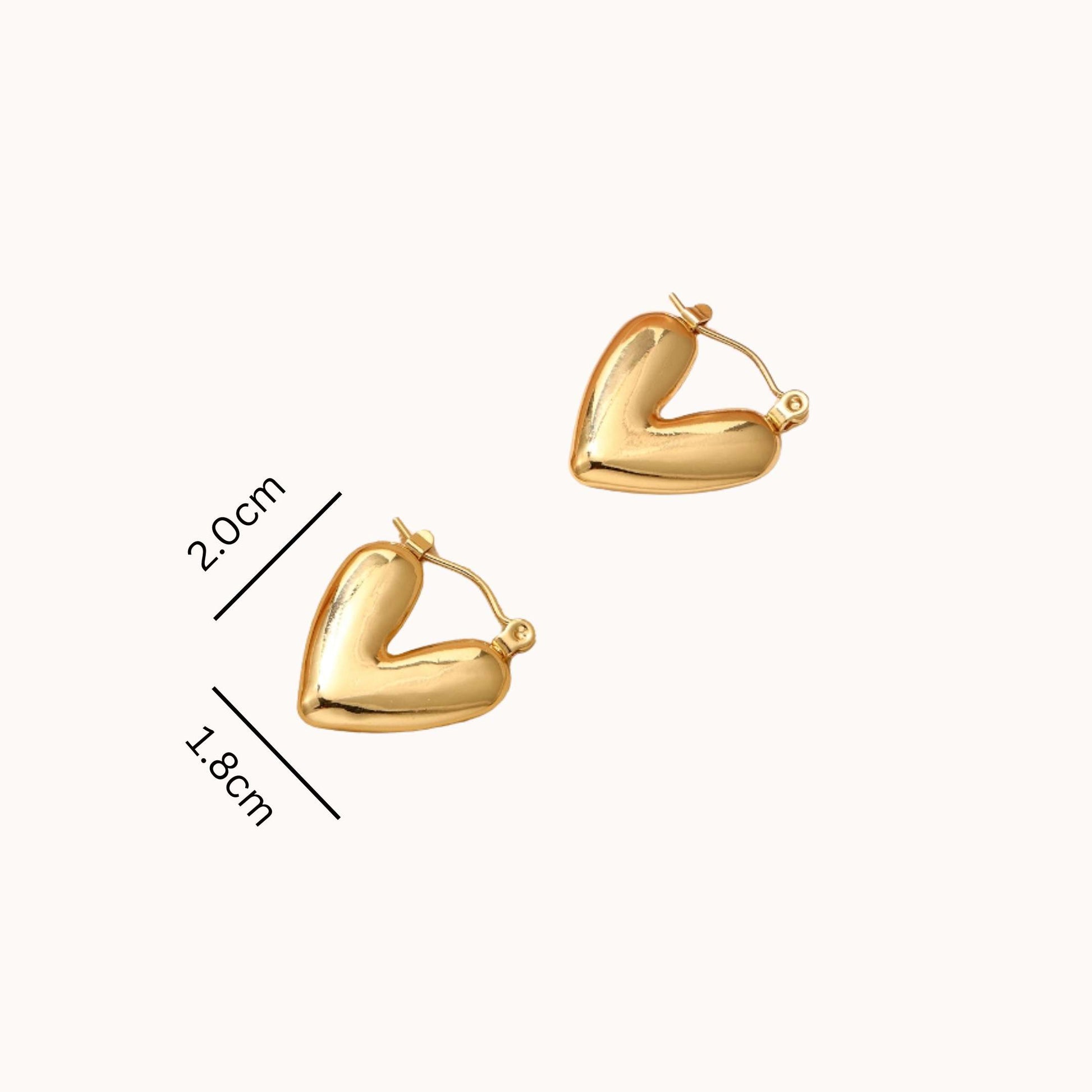 Gold heart-shaped hoop earrings with measurements on a white background