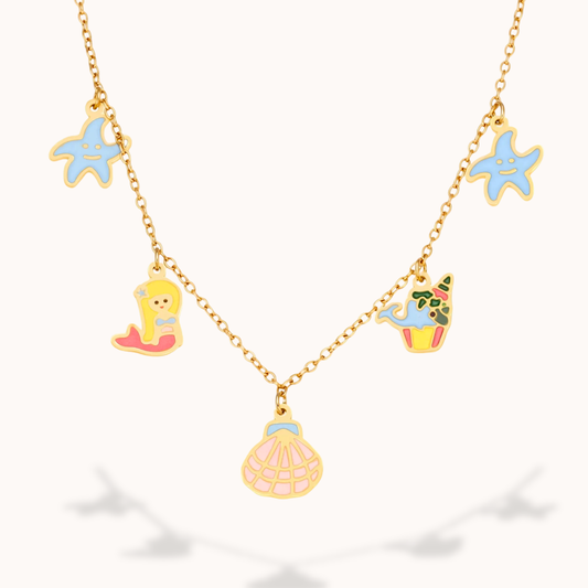 Necklace with colorful charms including a mermaid, shell, and starfish on a white background