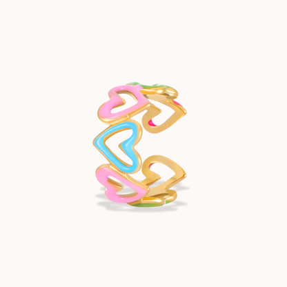 Colorful heart-shaped ring on a white background