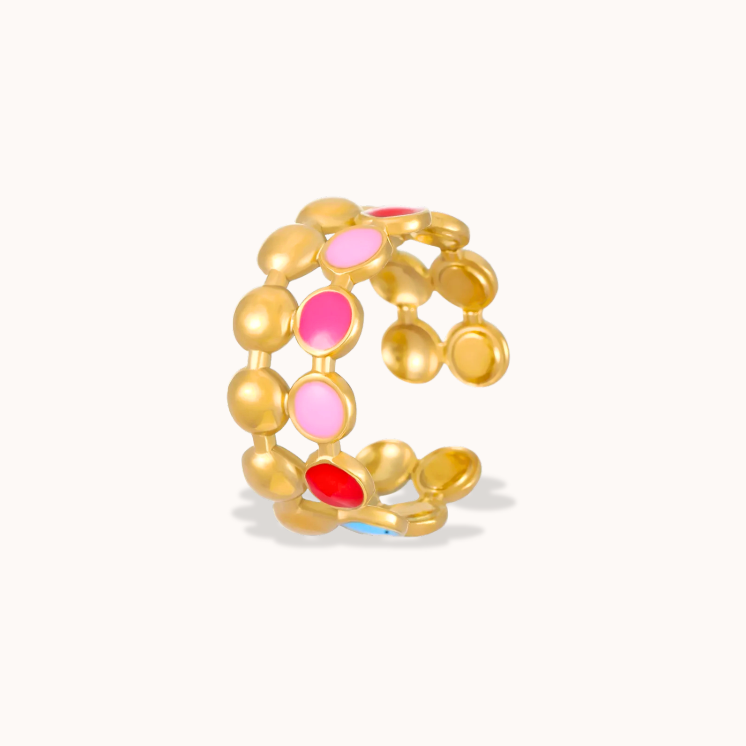 Gold ring with colorful beads on a white background