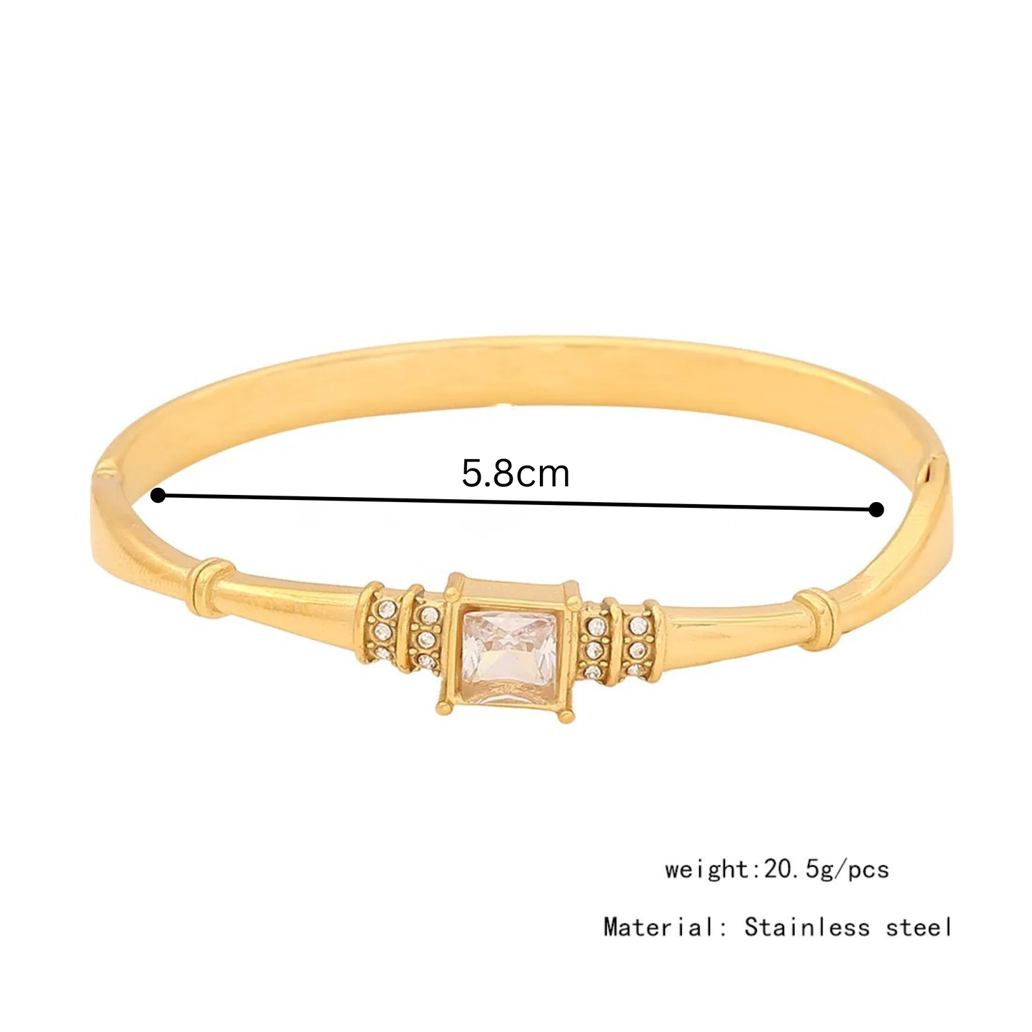 Gold bracelet with measurement details on a white background