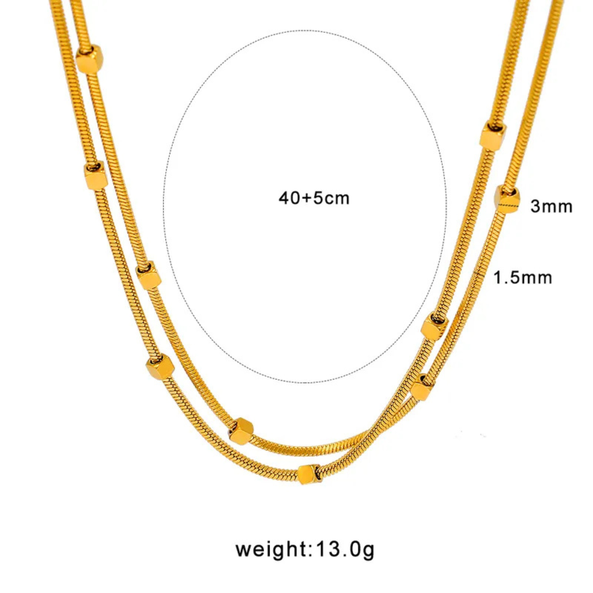 Gold necklace with measurements on a white background