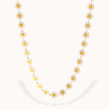 Necklace with daisy flower pendants on a white background