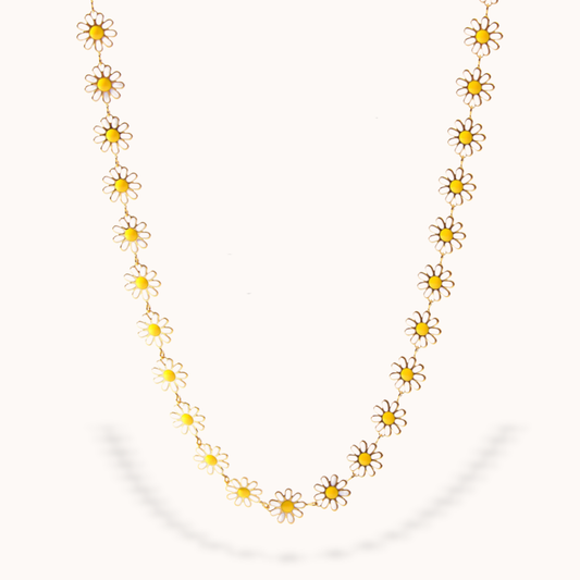 Necklace with daisy flower pendants on a white background