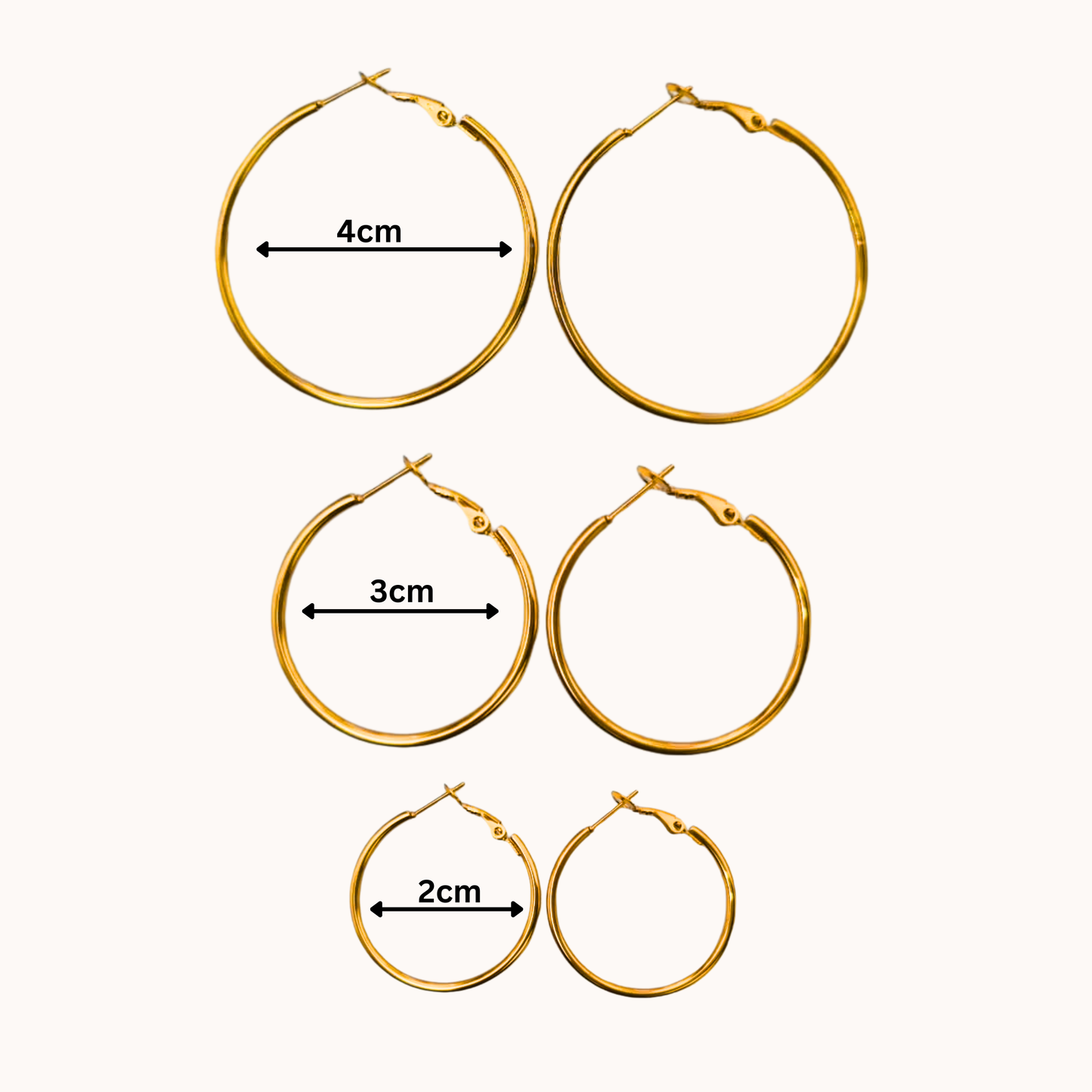 Set of gold hoop earrings with measurements on a white background