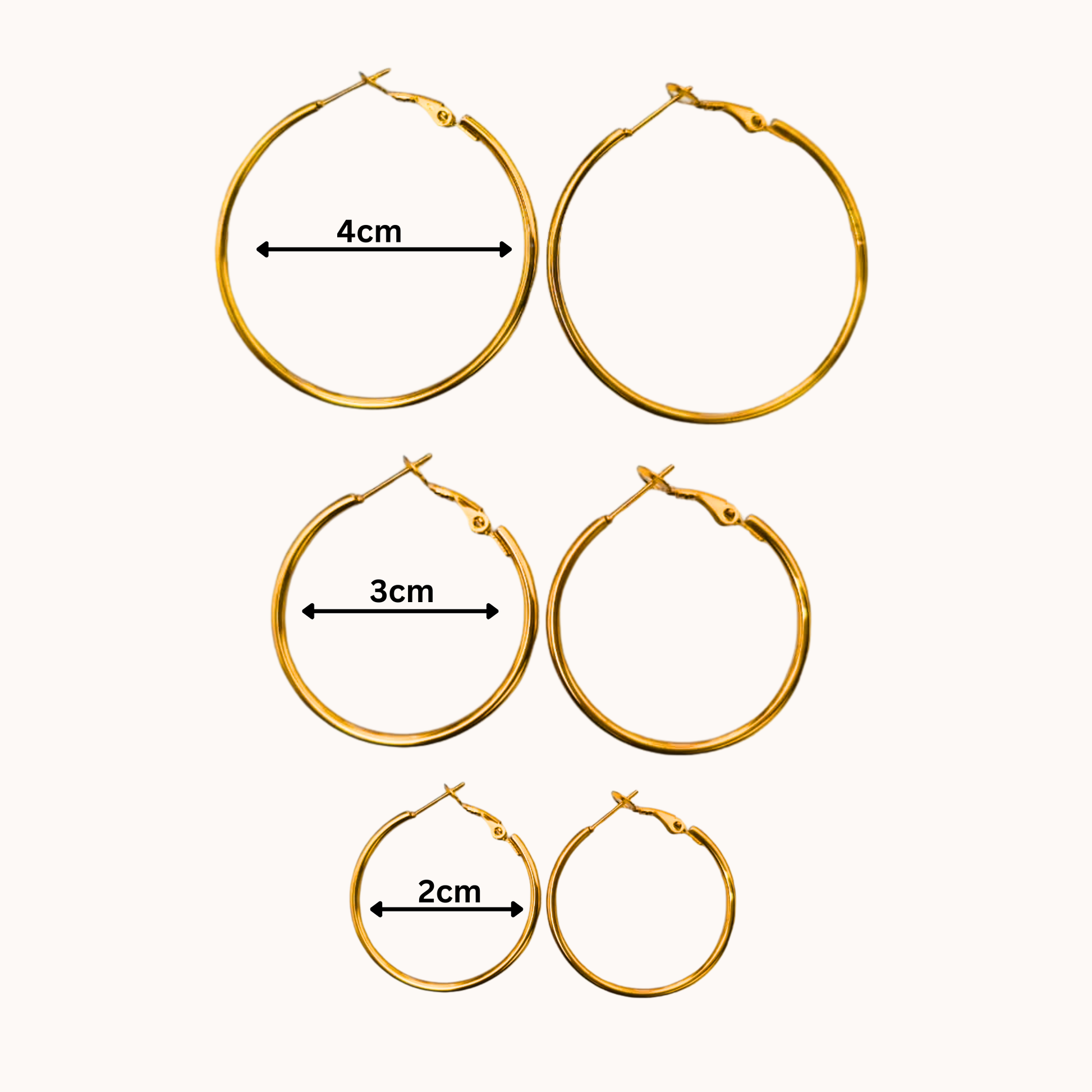 Set of gold hoop earrings with measurements on a white background