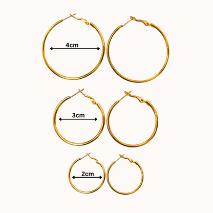 Set of gold hoop earrings with measurements on a white background