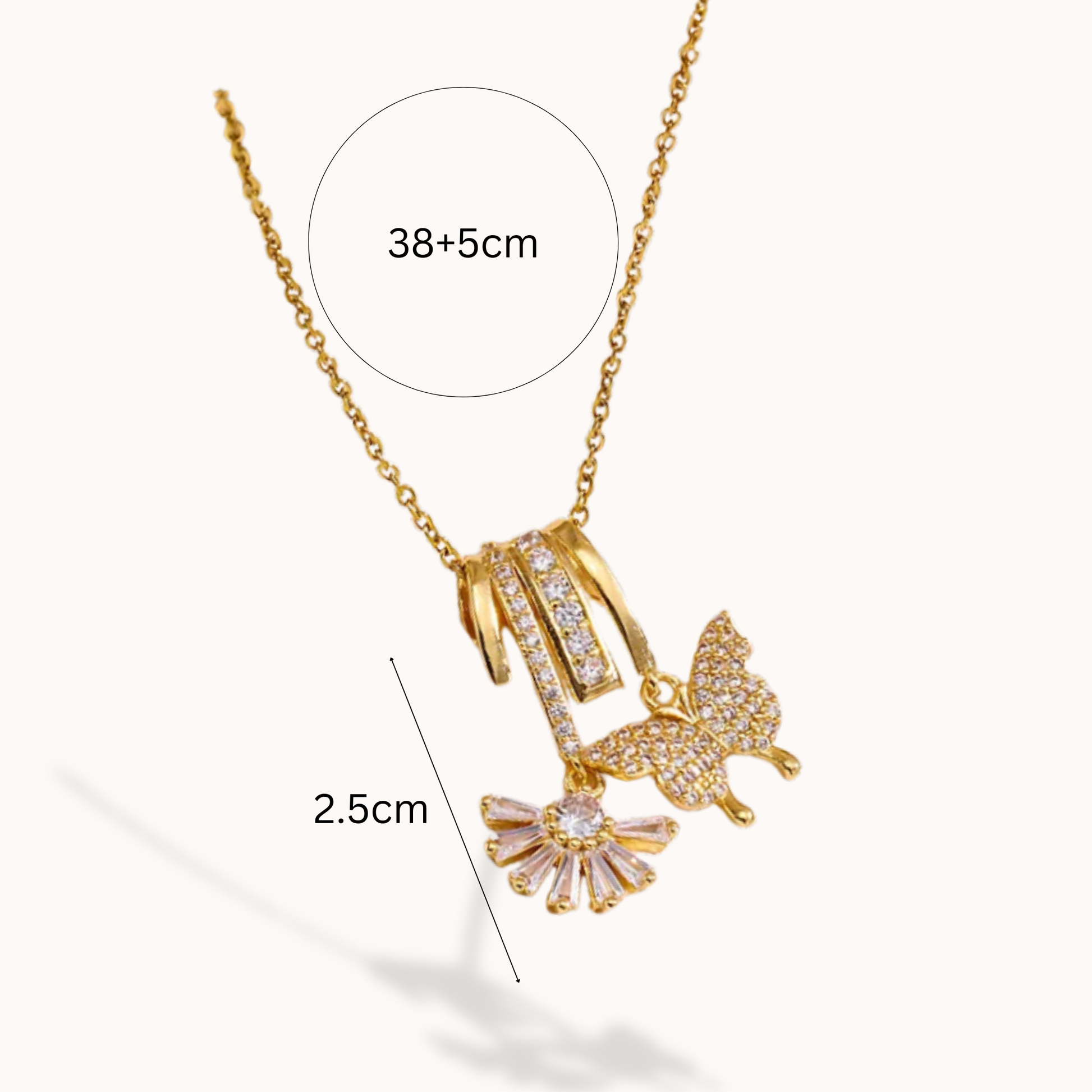 Gold necklace with pendant on a white background