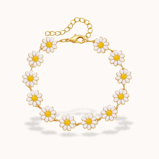 Bracelet with daisy flower charms on a white background