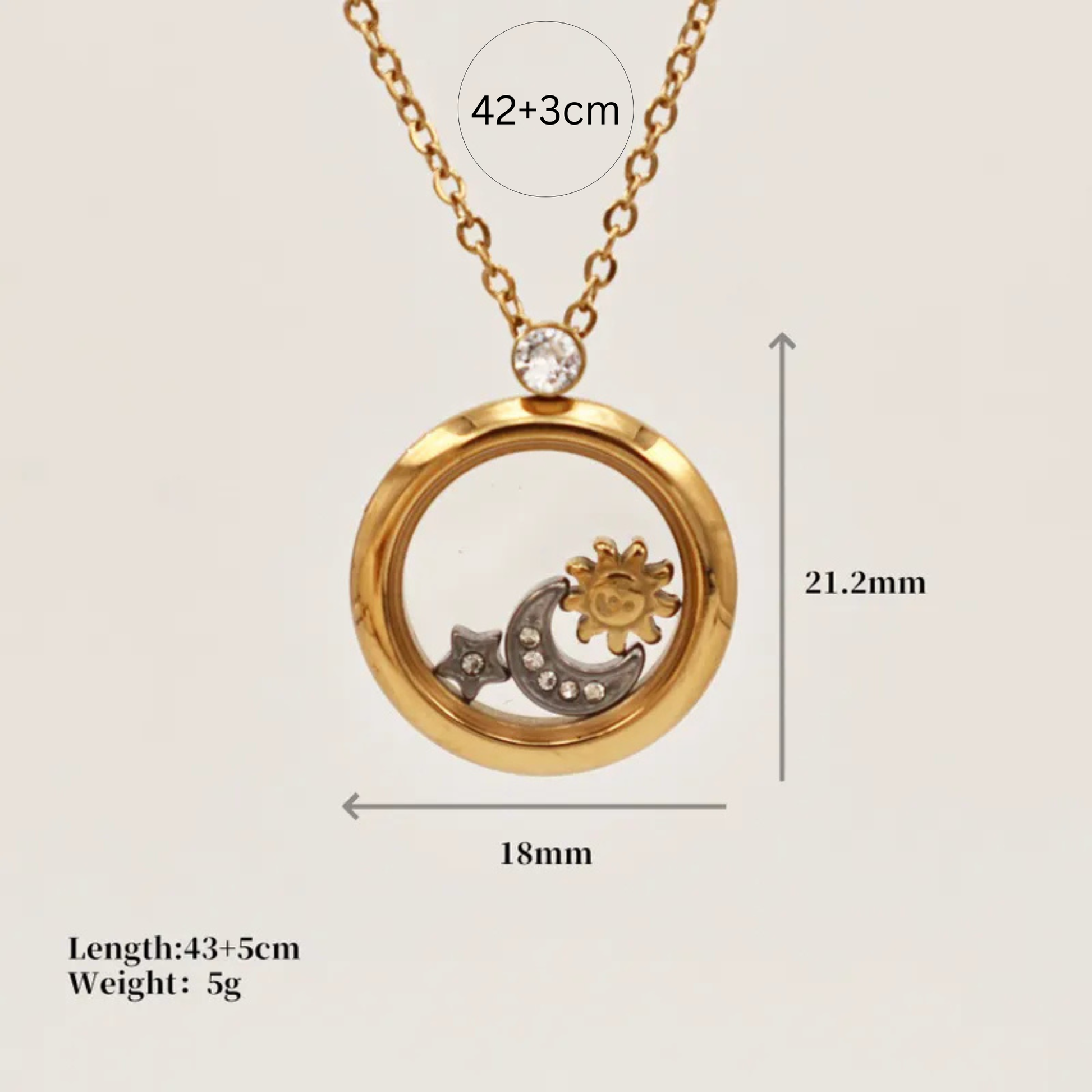Gold necklace with circular pendant featuring sun and moon design, measurements shown.