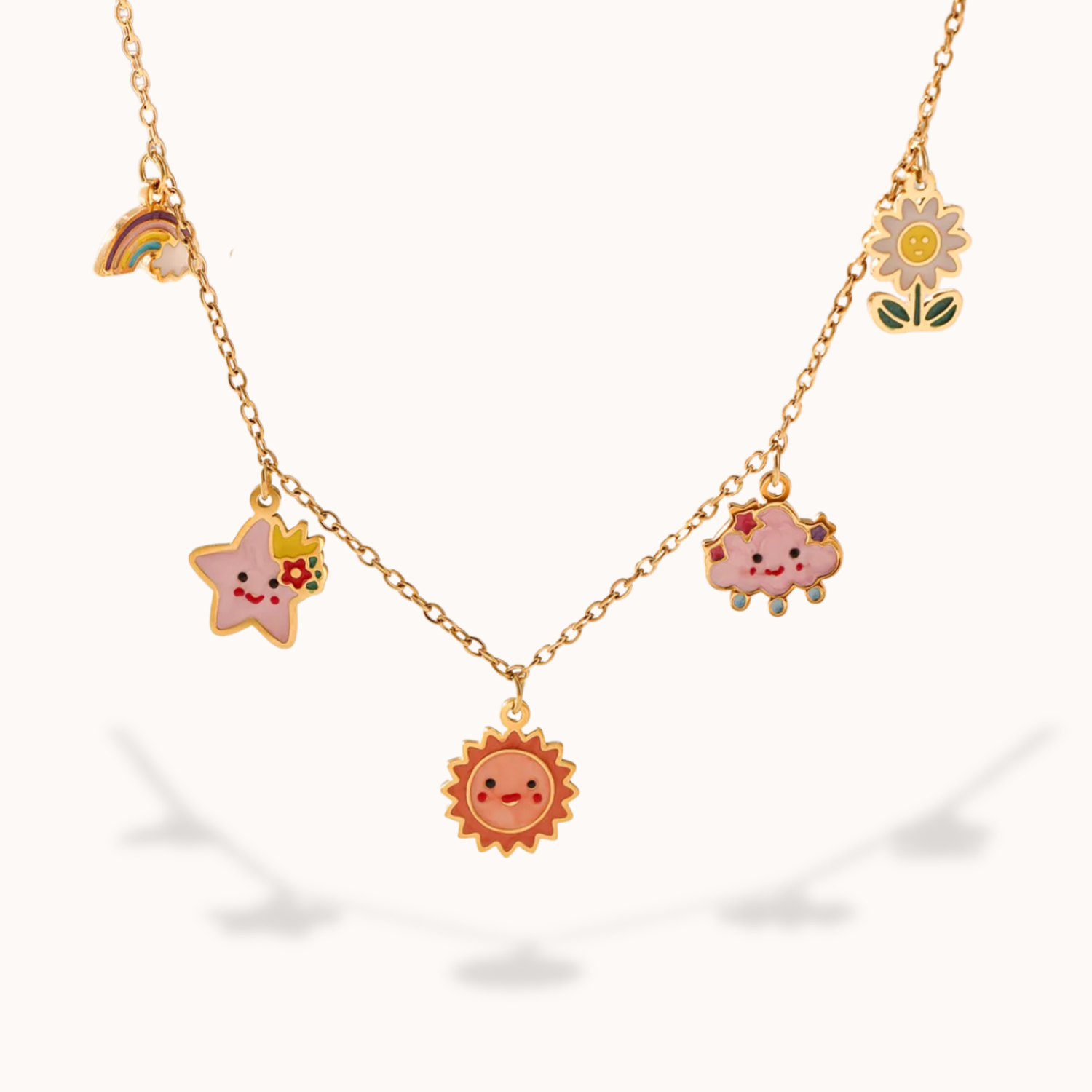 Necklace with cartoon-style charms including a star, sun, cloud, rainbow, and flower on a white background.