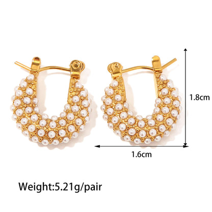 Gold hoop earrings with pearl detailing and measurements on a white background