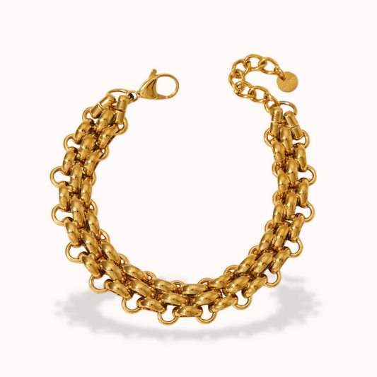 Gold chain bracelet on a white background