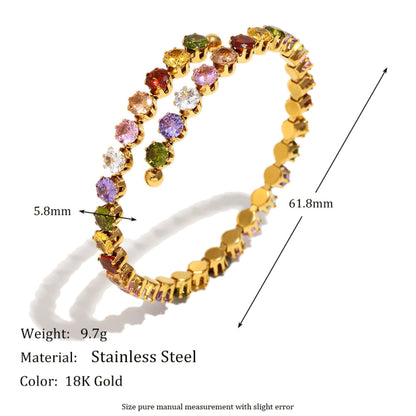 Gold bracelet with colorful stones and measurements on a white background