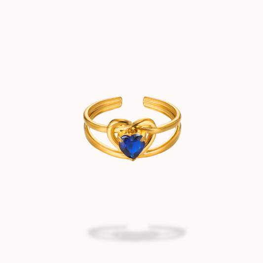 Blue Love diamond ring detail shot highlighting gold-plated finish