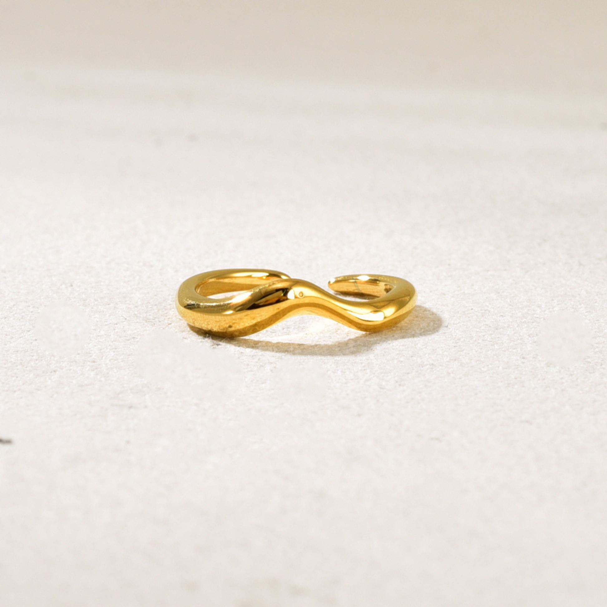 simple gold ring in white background