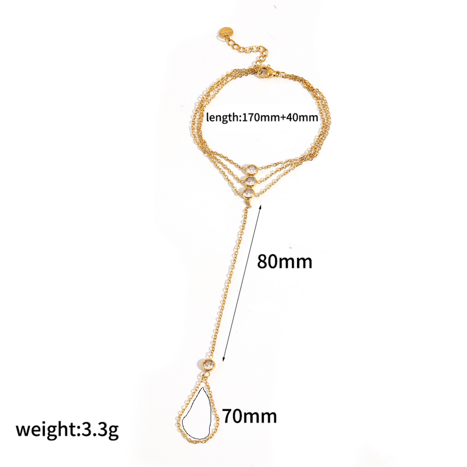 Gold ring bracelet with small gemstones on a wrist against a white background with measurement