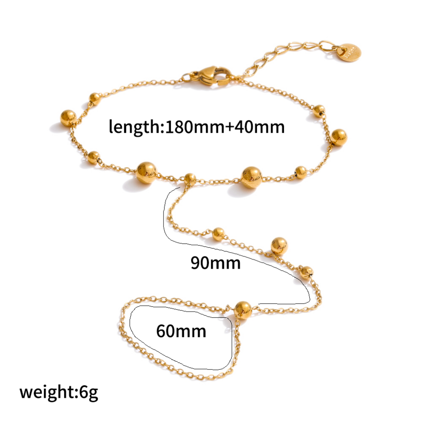 Gold ring bracelet with measurements on a white background