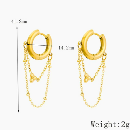 Gold hoop earrings with chains and measurements on a white background