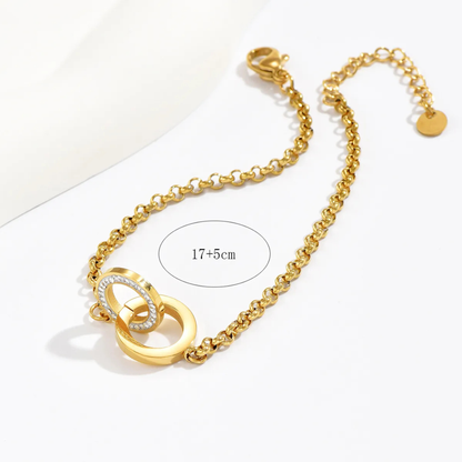 Gold bracelet with a clasp on a white background