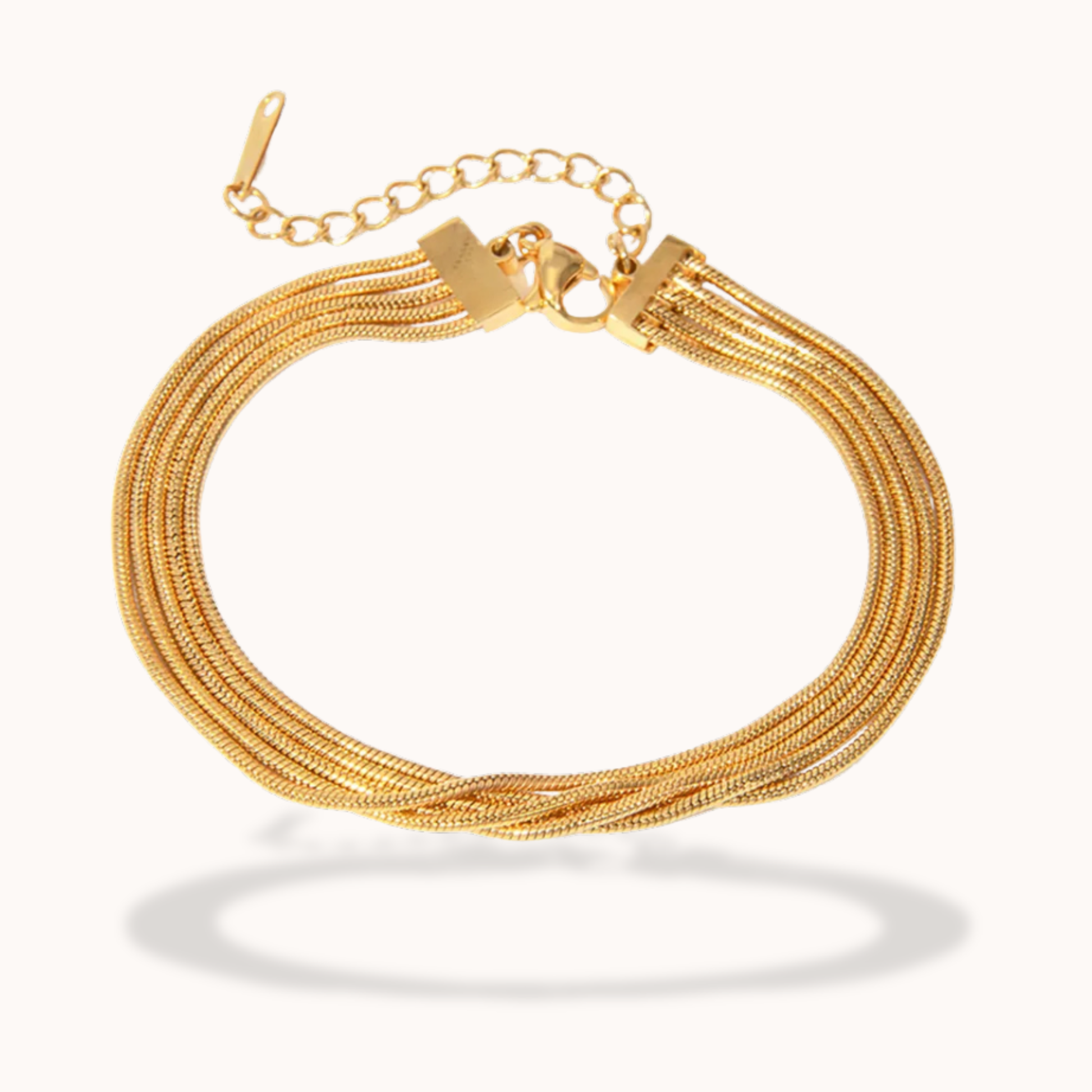 Gold bracelet with multiple strands on a white background