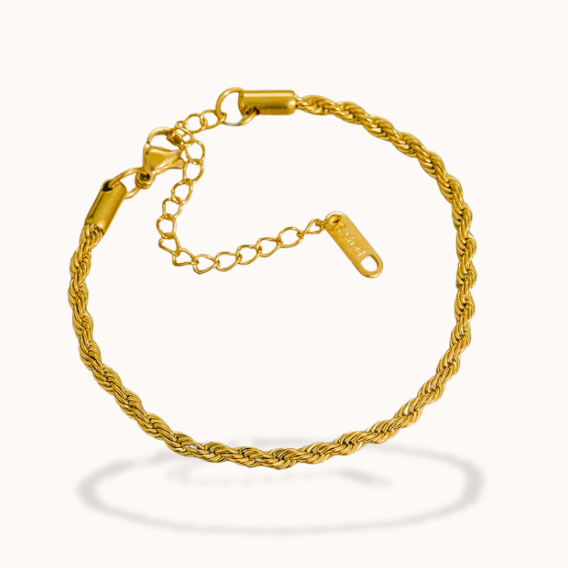 Gold bracelet on a white background