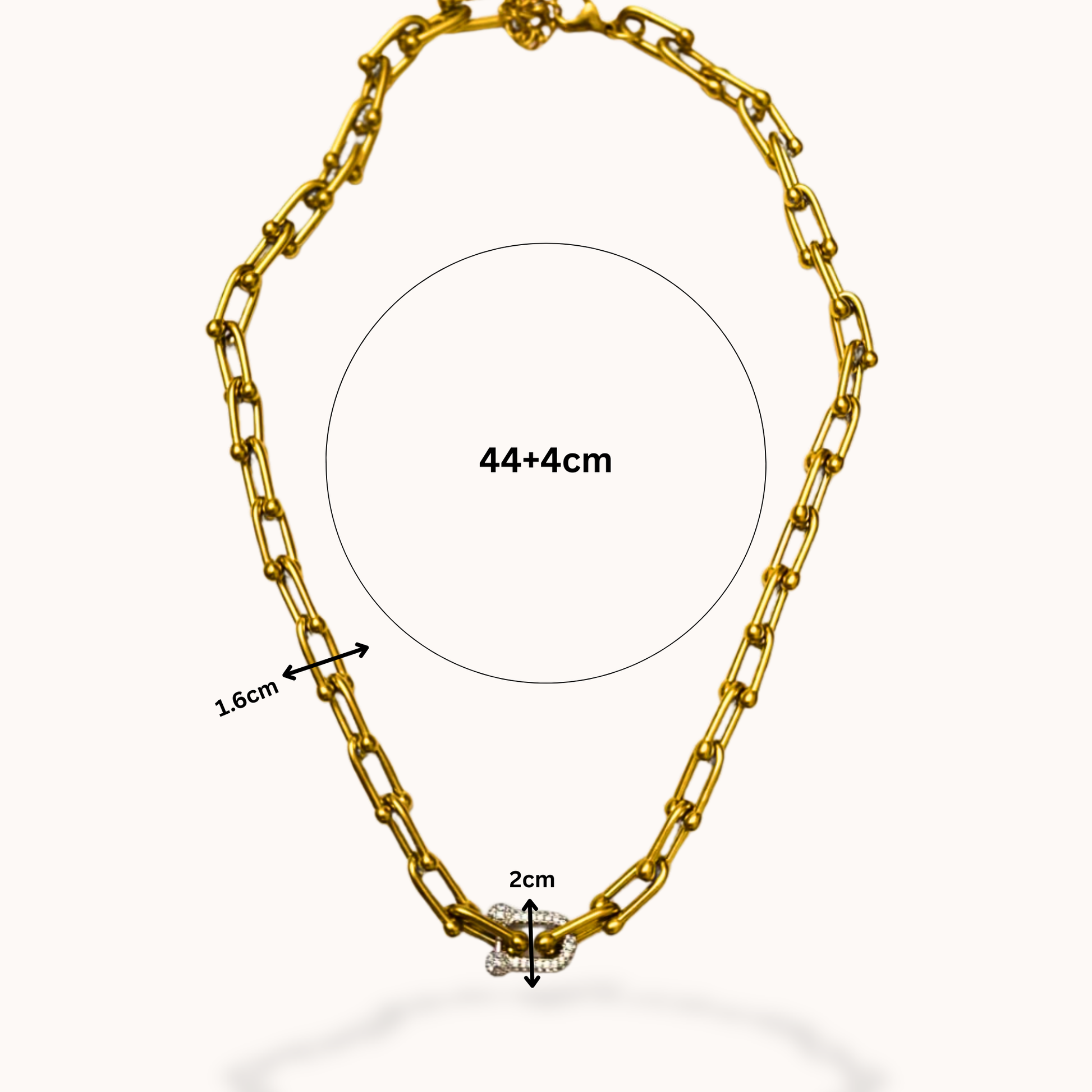 Gold chain necklace with measurements on a white background