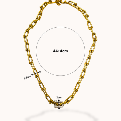 Gold chain necklace with measurements on a white background