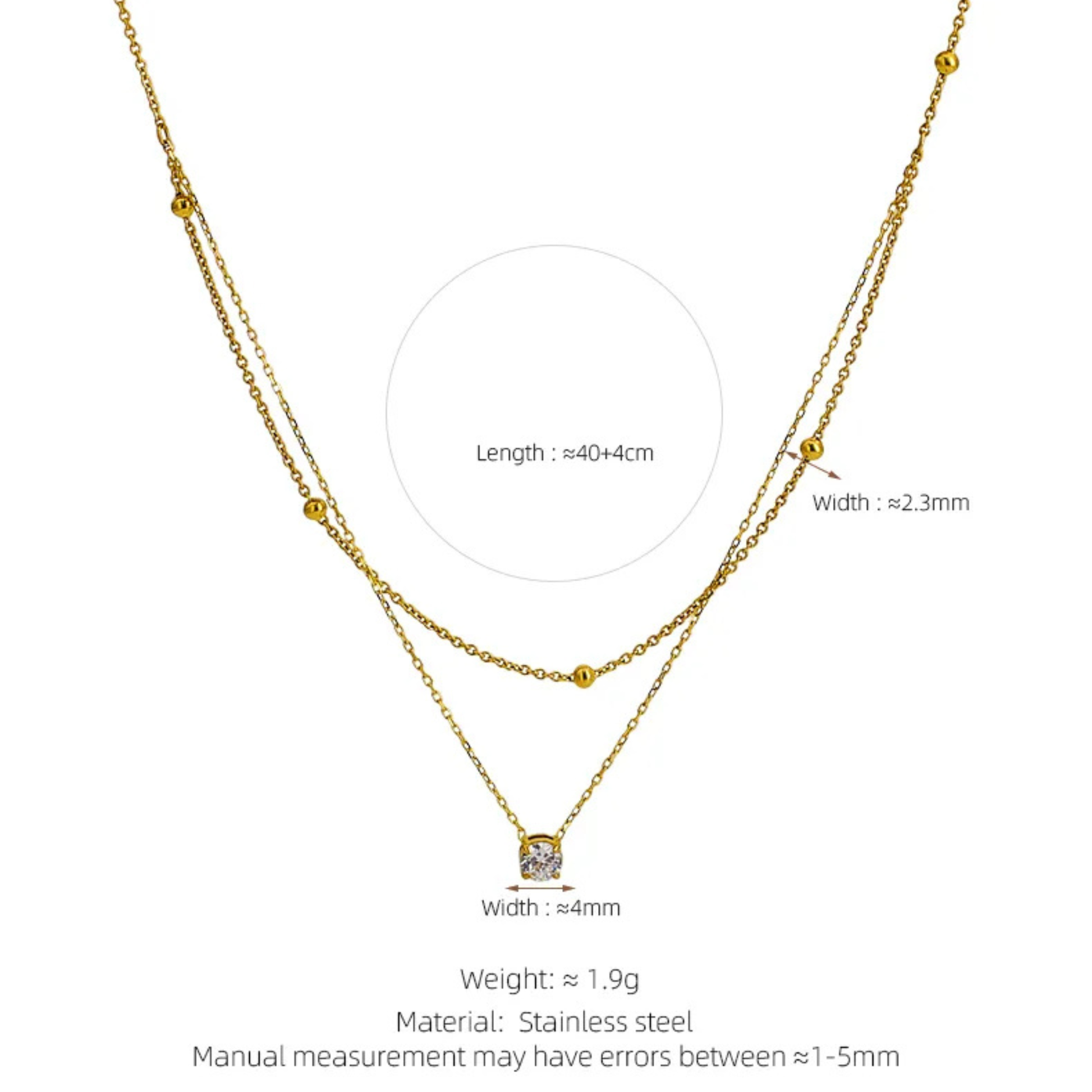 Gold necklace with measurement details on a white background