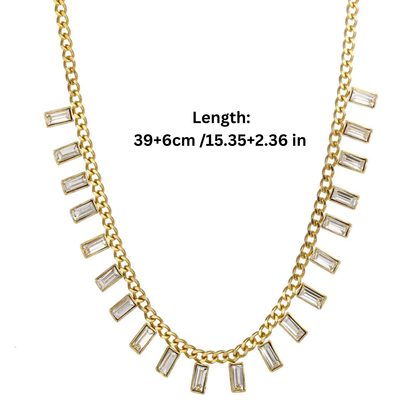Gold necklace with clear stones and length measurement on a white background