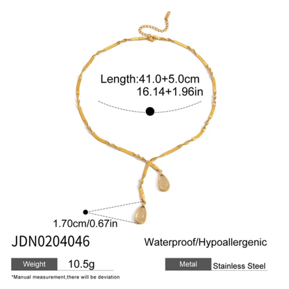 Gold necklace with measurements and product details on a white background