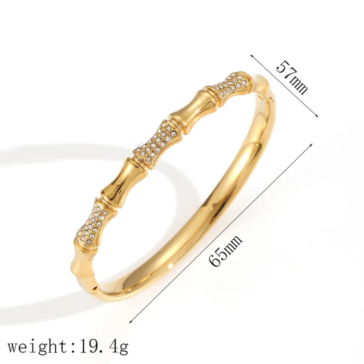 Gold bracelet with measurements and weight on a white background