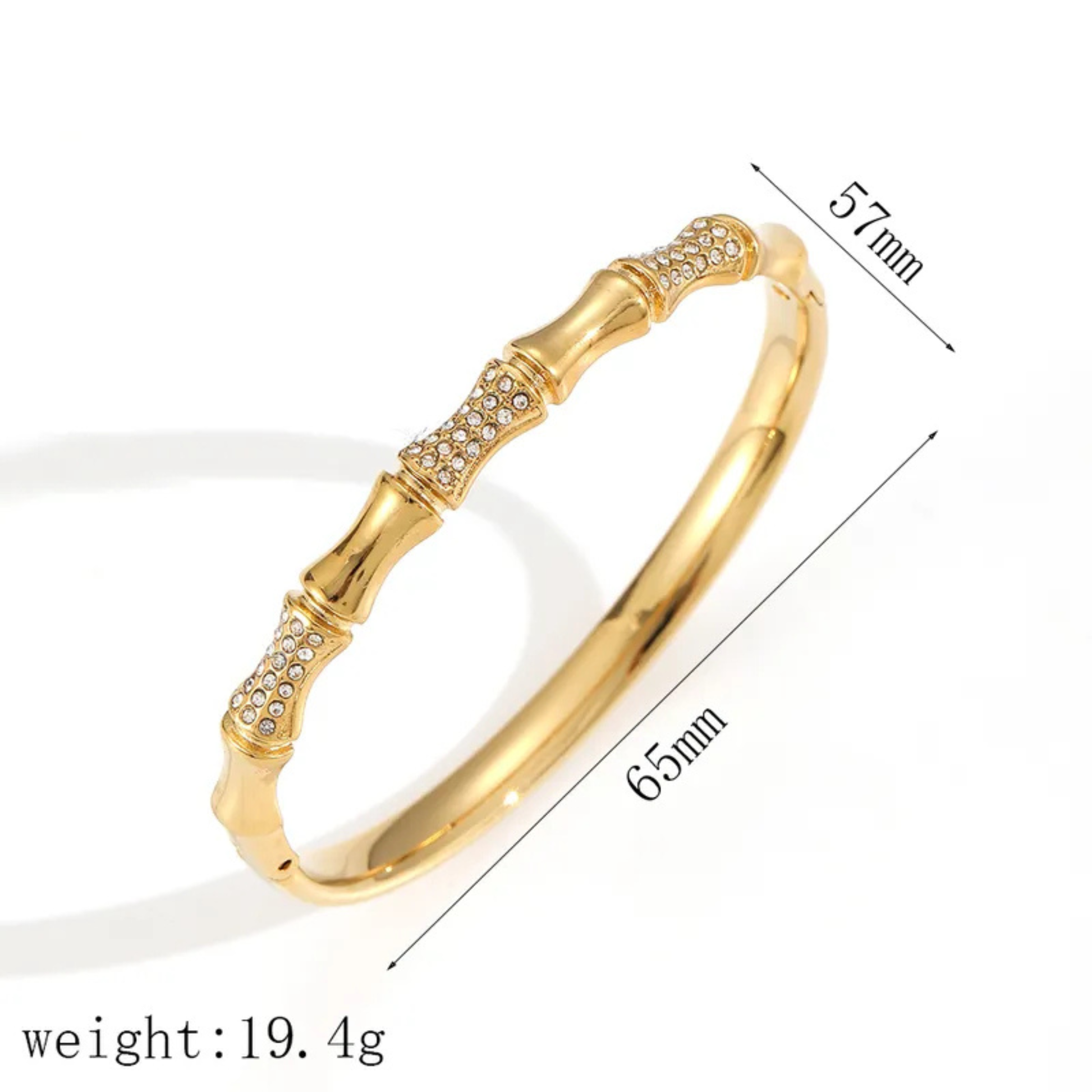 Gold bracelet with measurements and weight on a white background