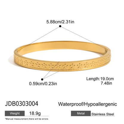 Gold bracelet with measurements and product details on a white background
