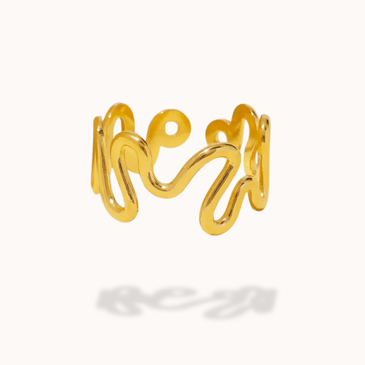 Gold open ring on a white background