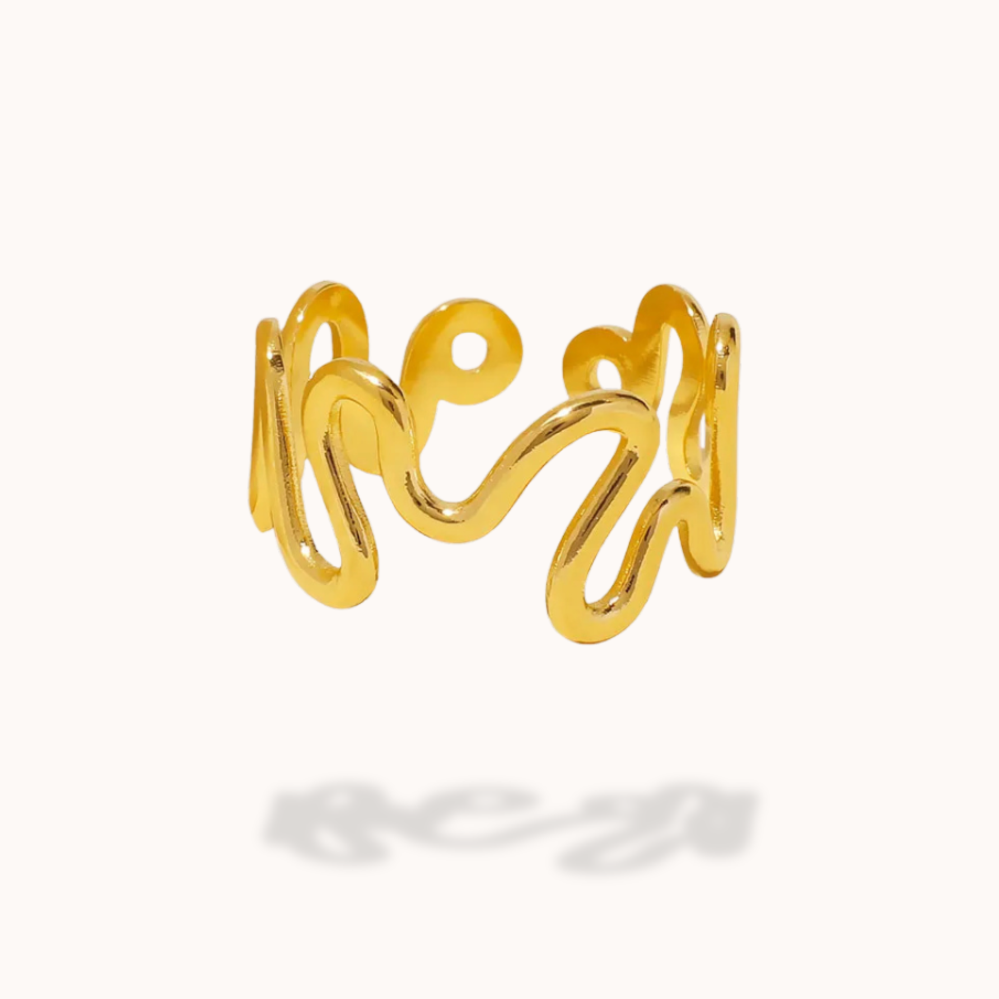 Gold open ring on a white background