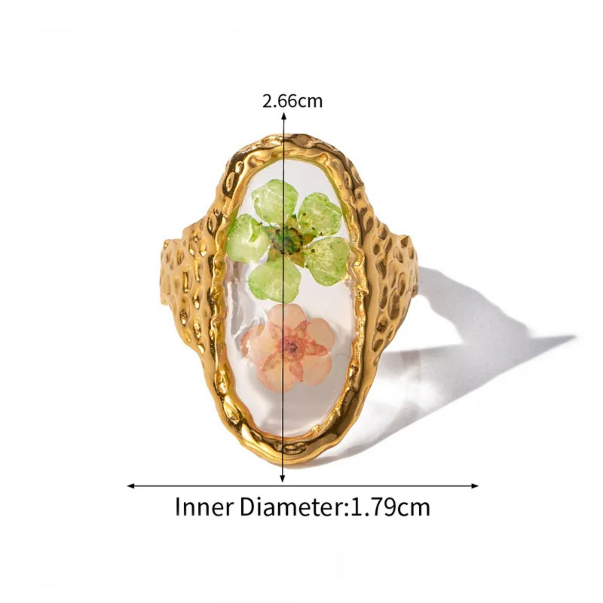 Gold ring with floral design and measurements on a white background