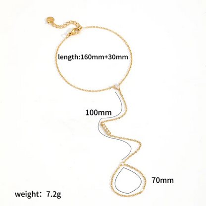 Gold ring bracelet with measurements on a white background